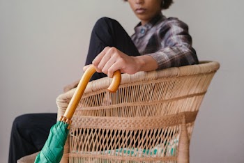Woman Holding Green and Brown Umbrella