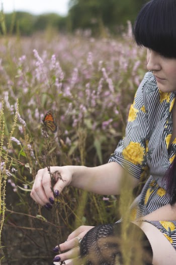 Woman Holding Green Plant