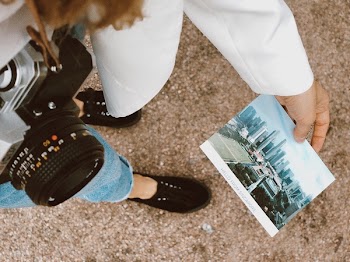 Woman Holding Hello from Singapore Photo