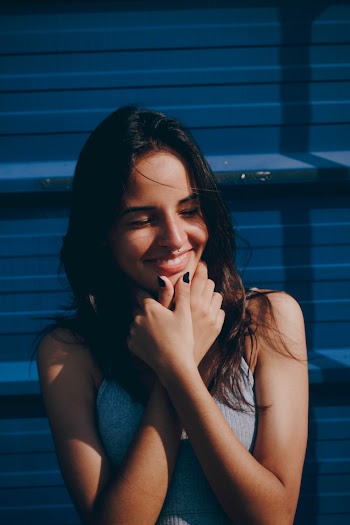 Woman Holding Her Chin