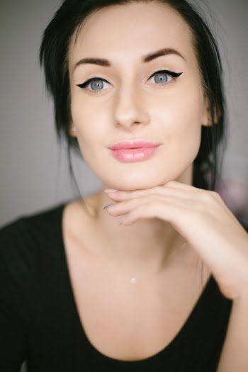 Woman Holding Her Chin