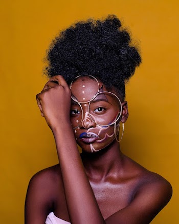 Woman Holding Her Face