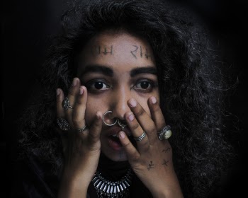 Woman Holding Her Face and Shocked