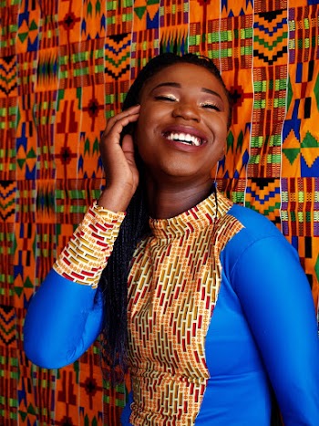 Woman Holding Her Face While Smiling