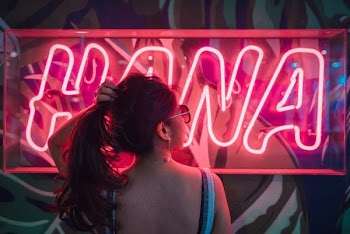 woman holding her hair