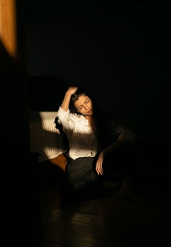 Woman Holding Her Hair
