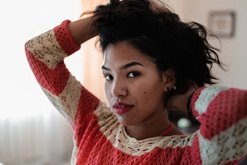 Woman Holding Her Hair