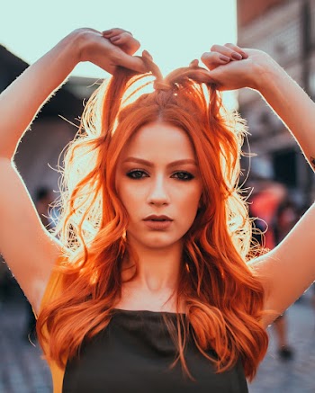 Woman Holding Her Hair