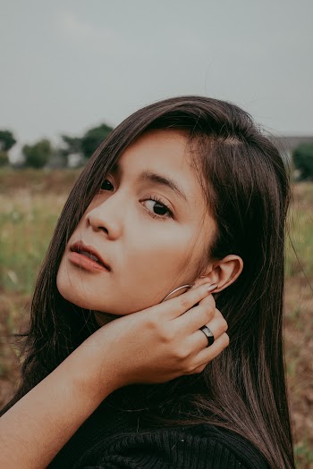 Woman Holding Her Hair