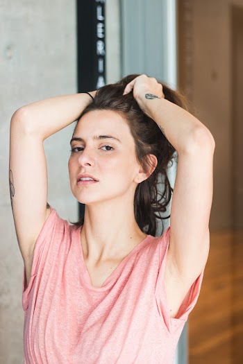 Woman Holding Her Hair