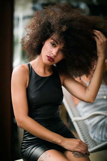 Woman Holding Her Hair