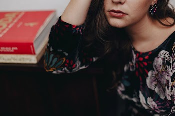 Woman Holding Her Head