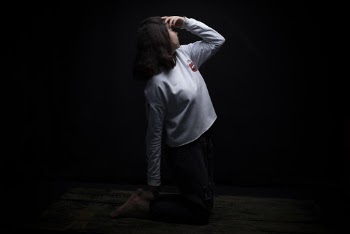 Woman Holding Her Head