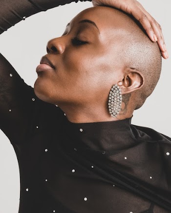 Woman Holding Her Head