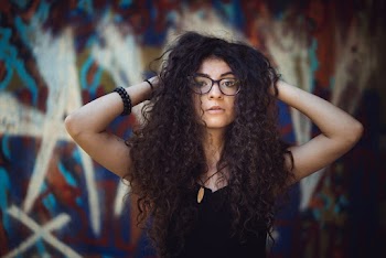 Woman Holding Her Head