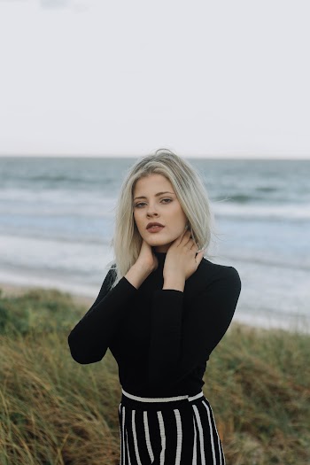 Woman Holding Her Neck