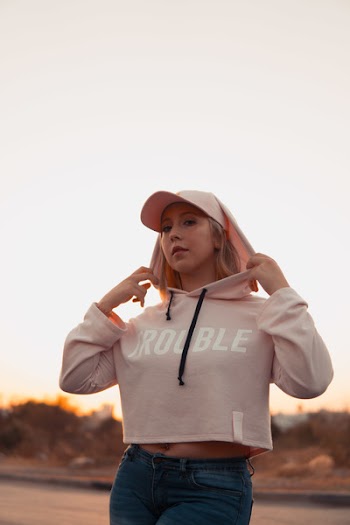 Woman Holding Hoodie