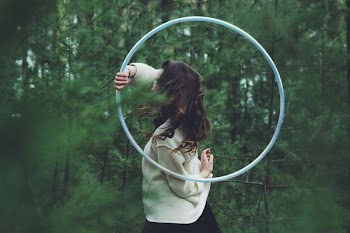 woman holding hulahoop