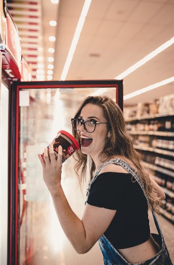 Woman Holding Ice Cream Tub