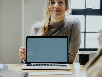 Woman Holding Laptop