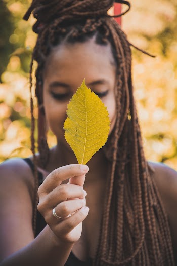 Woman Holding Leaf