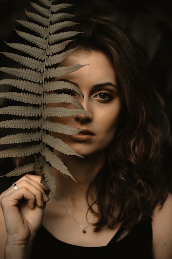 Woman Holding Leaf