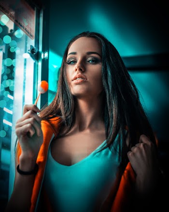 Woman Holding Lollipop