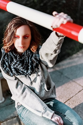 Woman Holding Metal Bar