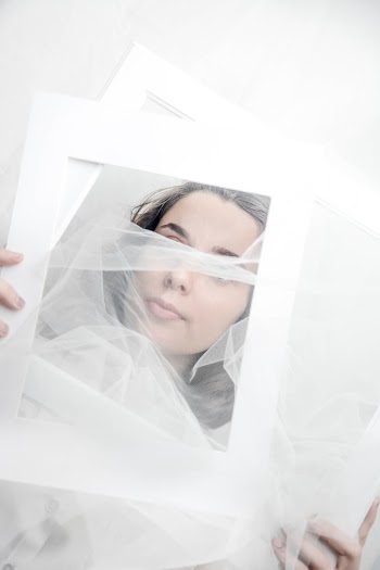 Woman Holding Mirror