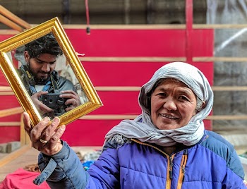 Woman Holding Mirror