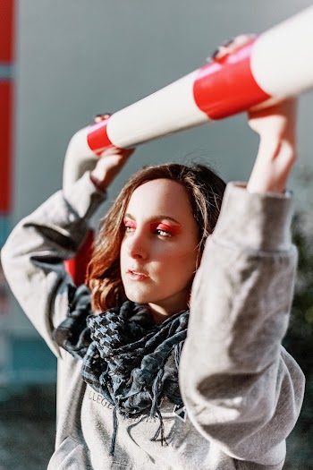 Woman Holding On Rail