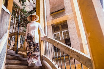 Woman Holding On Railing