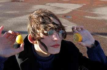 Woman Holding Orange Fruits