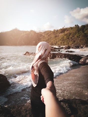 Woman Holding Person's Hand