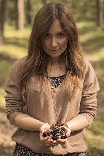 Woman Holding Pine Cones