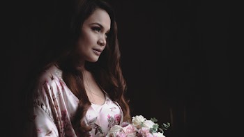 Woman Holding Pink and White Flower Bouquet