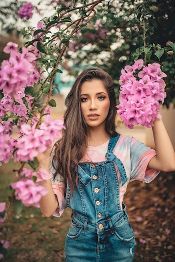Woman Holding Pink Flowers