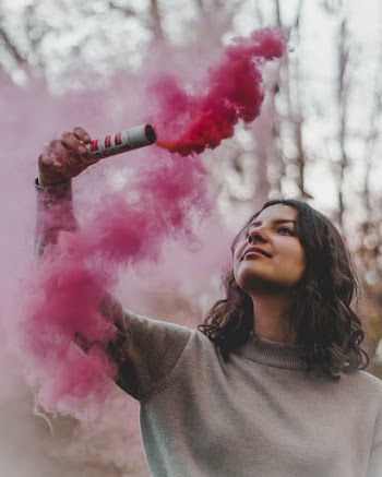 Woman Holding Pink Smoke