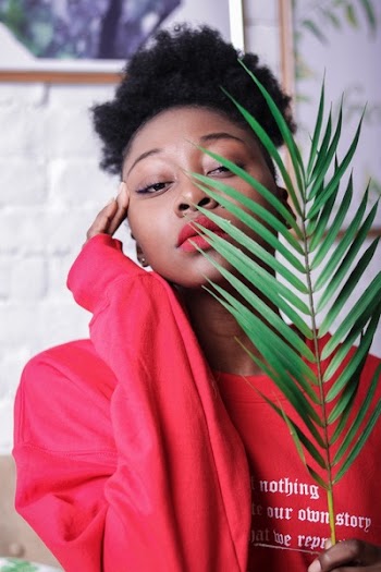 Woman Holding Plant