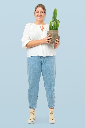 Woman holding potted cactus in sustainable… | Free stock photo | High Resolution image