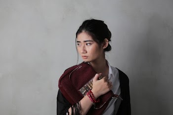 Woman Holding Red Bag