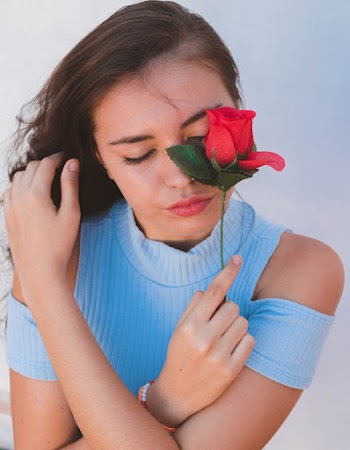 Woman Holding Rose