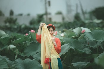 Woman Holding Scarf