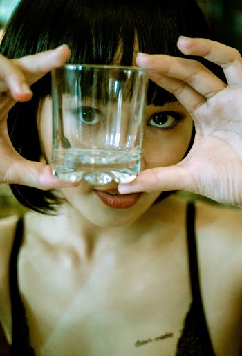 Woman Holding Shot Glass