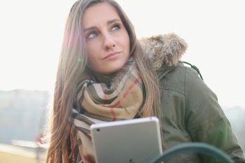 Woman Holding Silver Ipad
