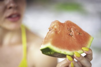 Woman Holding Sliced Watermelon