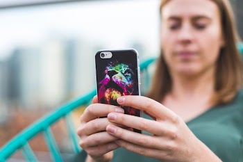 Woman Holding Smart Phone
