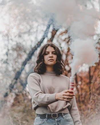 Woman Holding Smoke Bomb