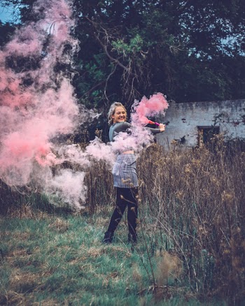 Woman Holding Smoke Bomb