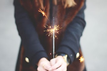 woman holding spark